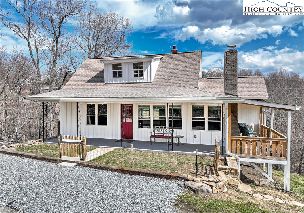 244 Flat Springs Road Elk Park, NC 28622 - Photo 25 of 25 front view of a house with a yard