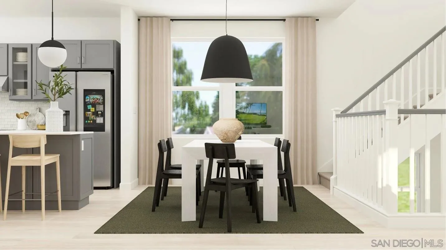 300 Triangular Road San Marcos, CA 92078 - Photo 3 of 11 a view of a dining room with furniture window and wooden floor