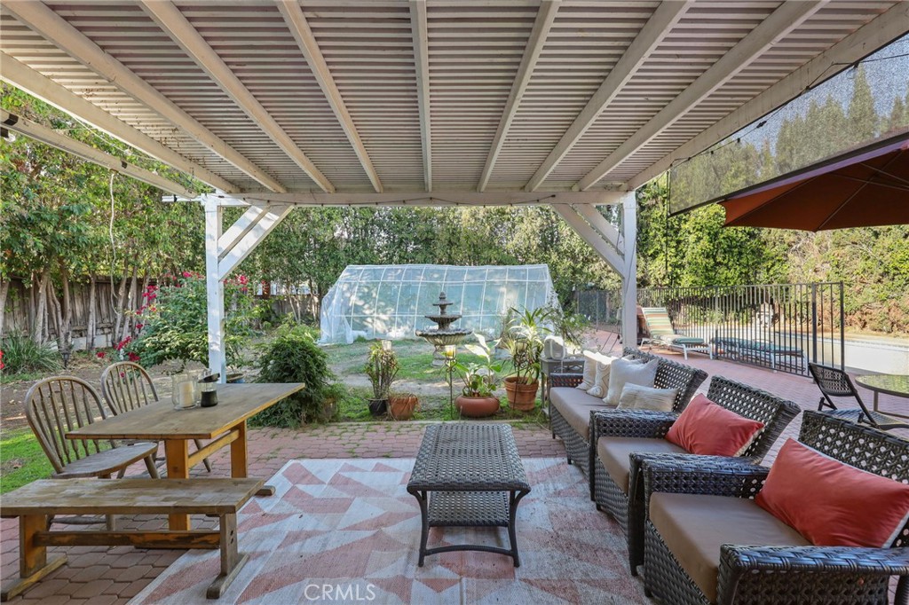 15719 Vose Street Lake Balboa, CA 91406 - Photo 32 of 41 a outdoor living space with furniture and garden view