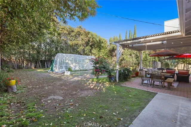 a outdoor living space with furniture and garden view