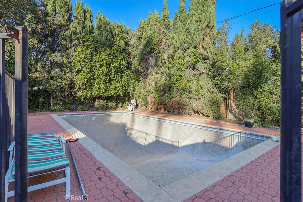 15719 Vose Street Lake Balboa, CA 91406 - Photo 37 of 41 a view of a balcony with yard