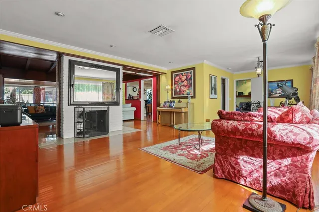 a balcony view with two chairs and a table