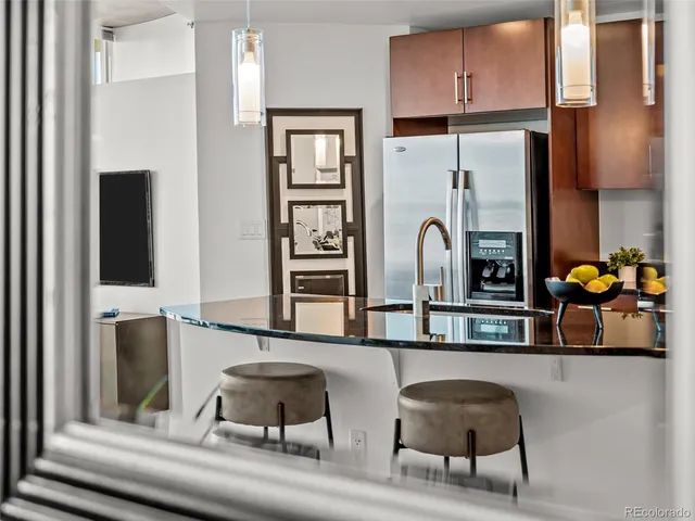 a black and white photo of a living room
