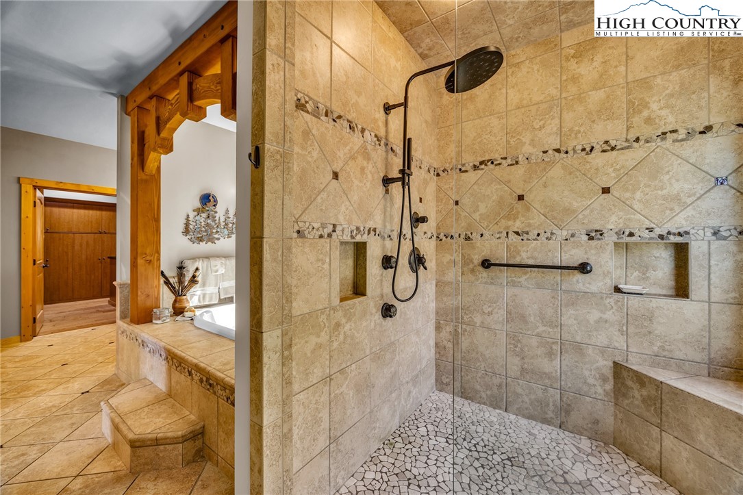 2650 Carson Woods Road Laurel Springs, NC 28644 - Photo 21 of 50 a bathroom with a shower