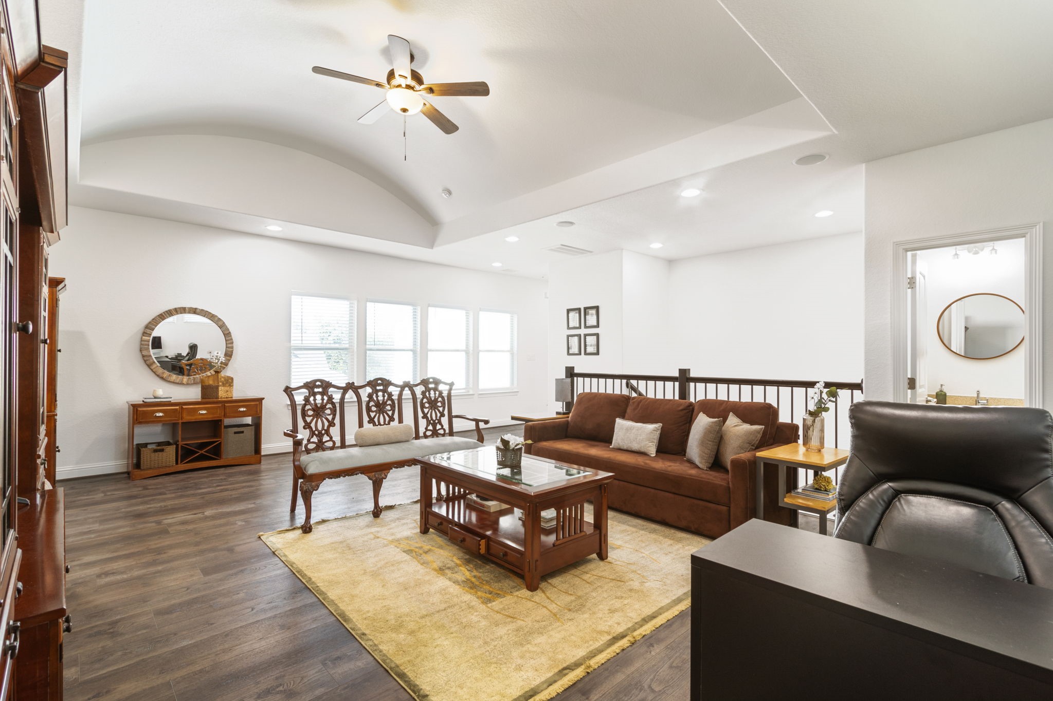 28518 Hoffman Spring Lane Fulshear, TX 77441 - Photo 29 of 50 Large gameroom at thte top of the stairs with arched ceiling and lots of natural light.