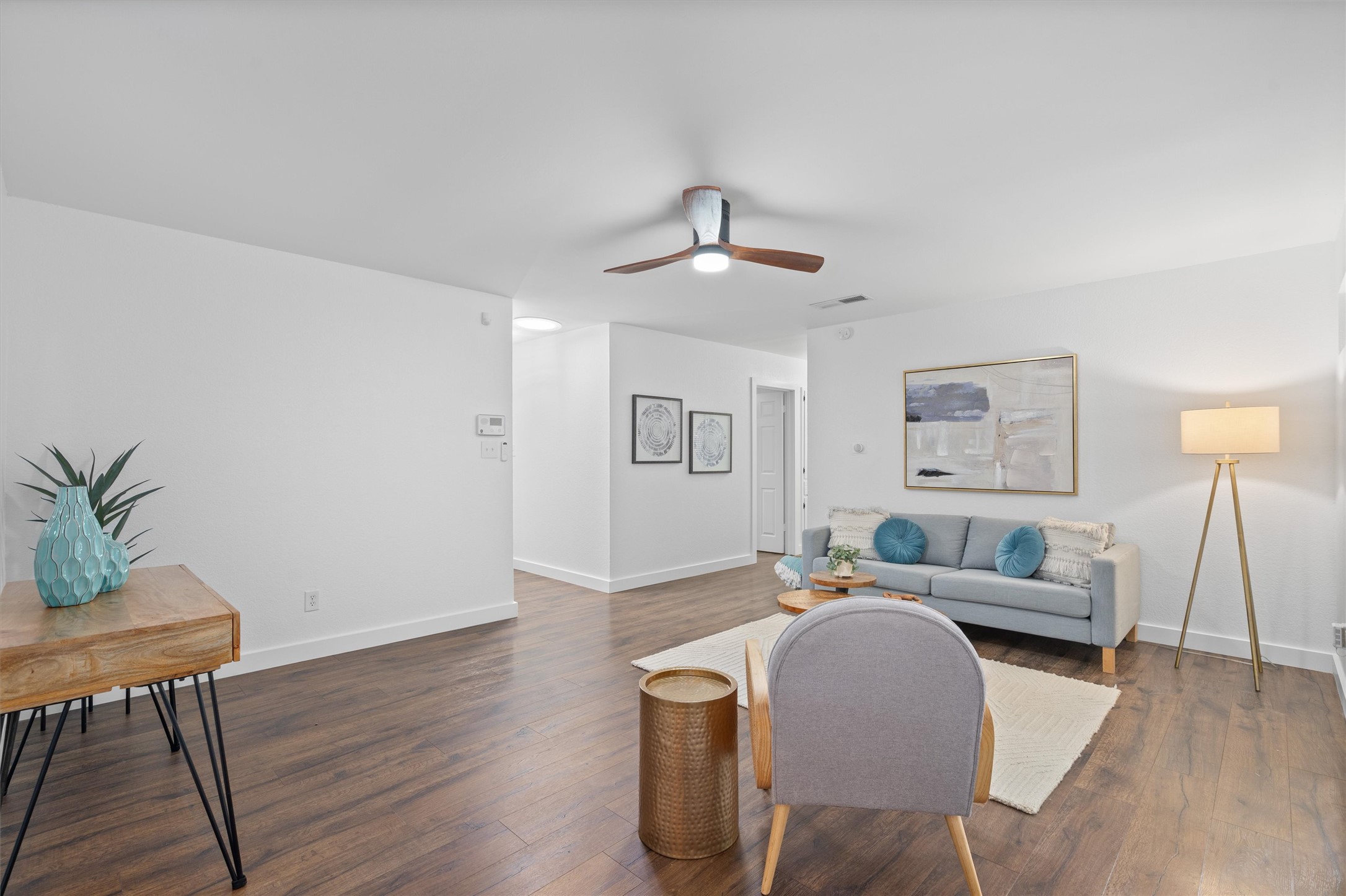 8436 Bangor Bend Austin, TX 78758 - Photo 7 of 29 Bright, open, and easy to style, this living space gives you flexibility without wasted space.