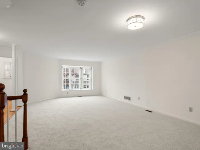 a bathroom with a toilet and a sink