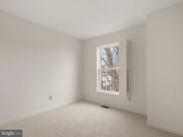 a view of storage and utility room with washer and dryer