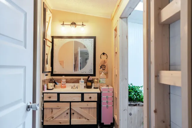 a view of an entryway with wooden floor