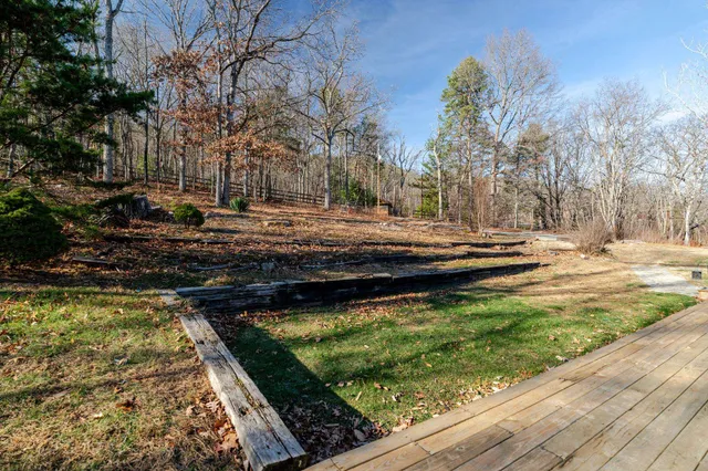 a view of the house with a swimming pool