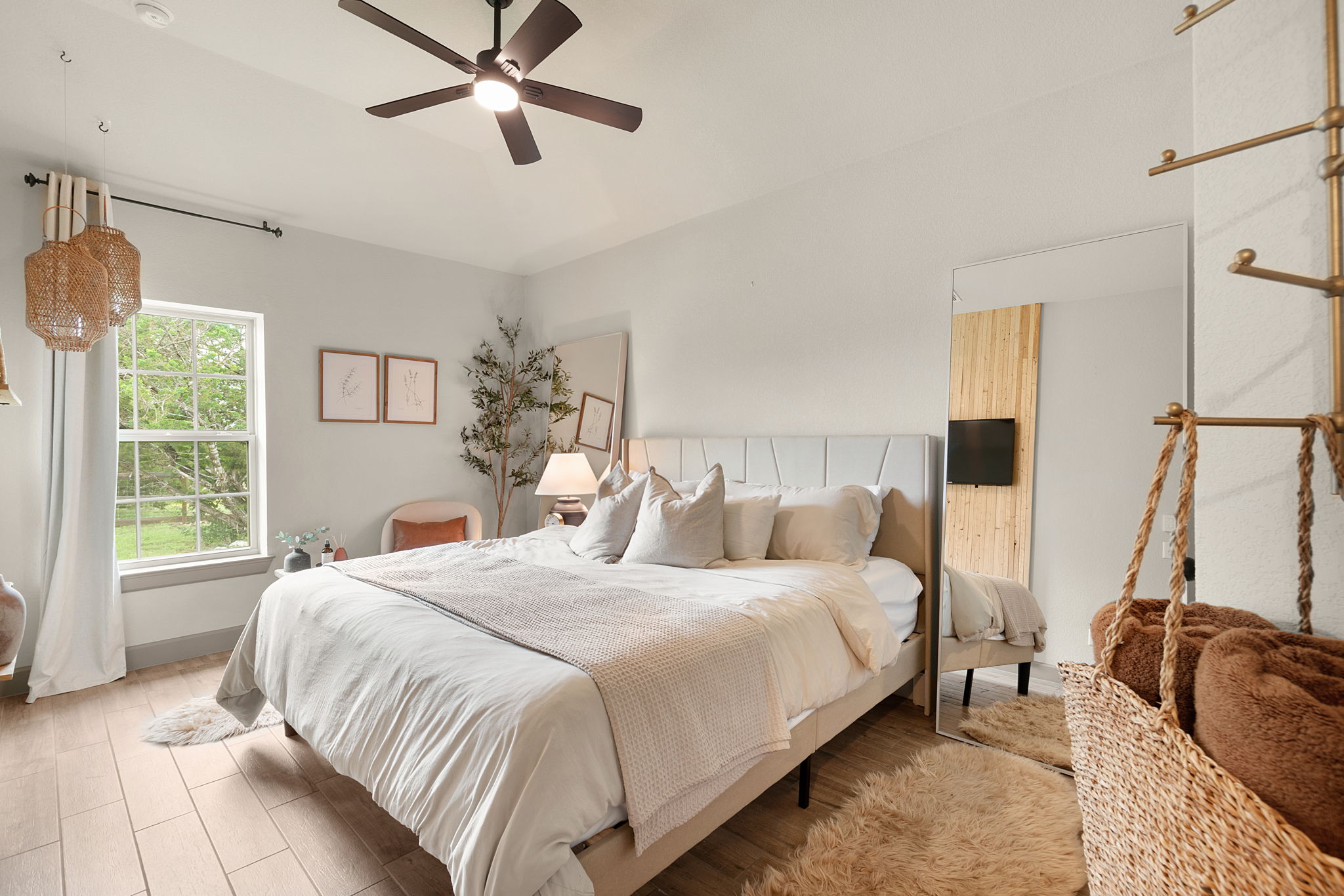 155 Balcones Ridge Way Bertram, TX 78605 - Photo 31 of 37 Natural light floods this inviting guest bedroom.