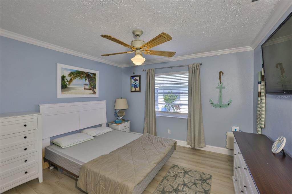 1041 Apollo Beach Boulevard, Unit F Apollo Beach, FL 33572 - Photo 20 of 35 a bedroom with a bed and window