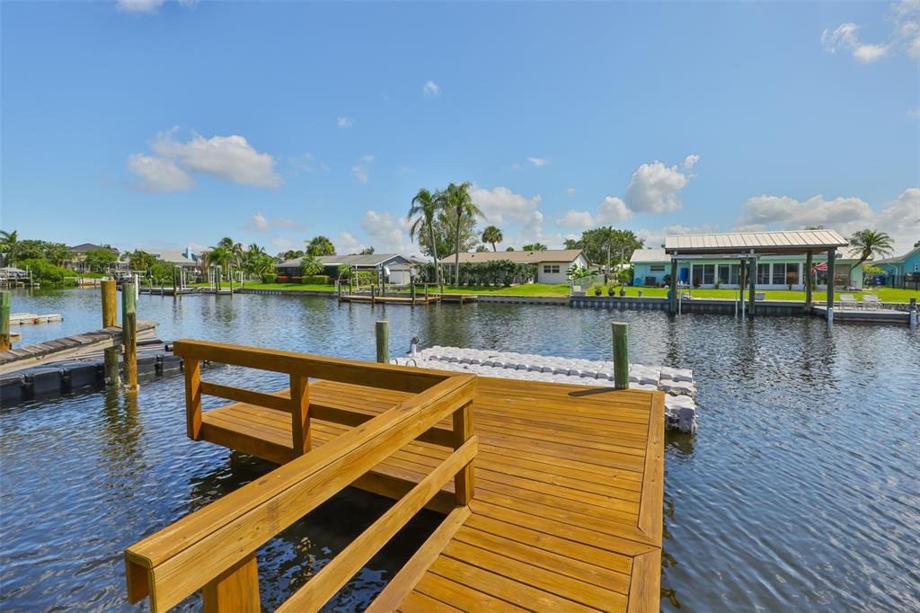 1041 Apollo Beach Boulevard, Unit F Apollo Beach, FL 33572 - Photo 6 of 35 a view of a lake with sitting area and lake view