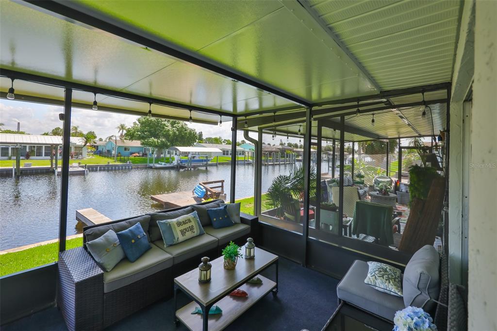1041 Apollo Beach Boulevard, Unit F Apollo Beach, FL 33572 - Photo 10 of 35 a sitting area with furniture and a potted plant