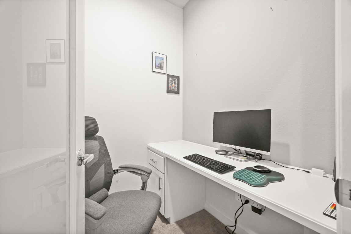 4002 Elser Street Houston, TX 77009 - Photo 11 of 36 a view of a workspace with furniture