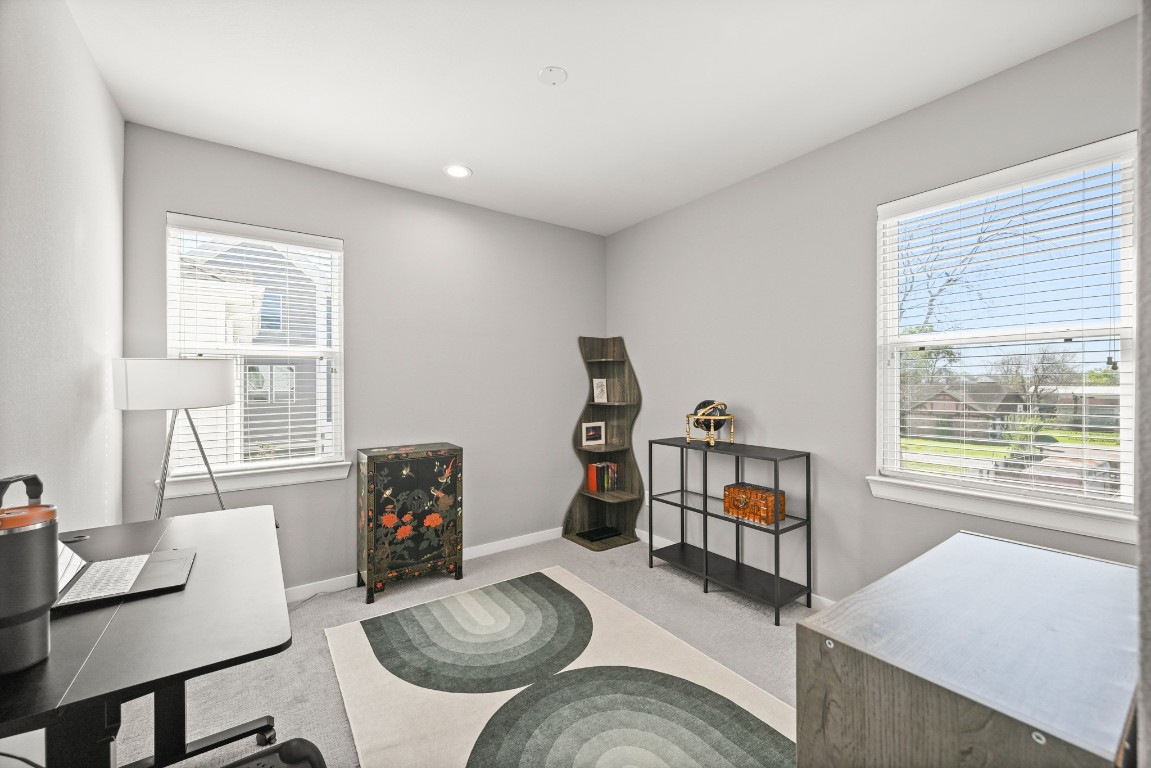 4002 Elser Street Houston, TX 77009 - Photo 25 of 36 a living room with furniture and a window