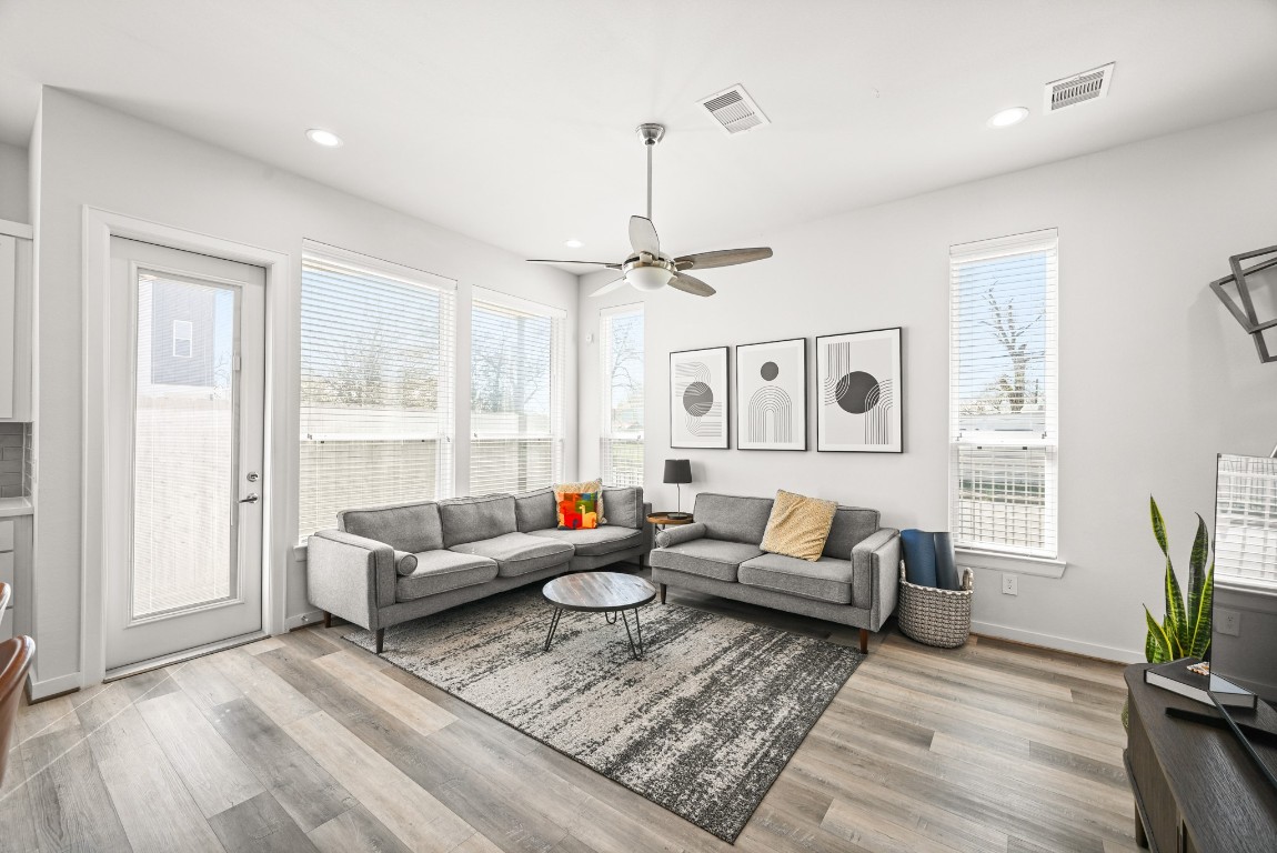 4002 Elser Street Houston, TX 77009 - Photo 3 of 36 a living room with furniture and a large window