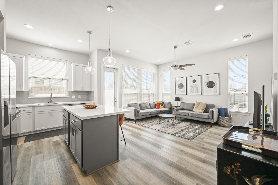 4002 Elser Street Houston, TX 77009 - Photo 5 of 36 a kitchen with sink refrigerator and window