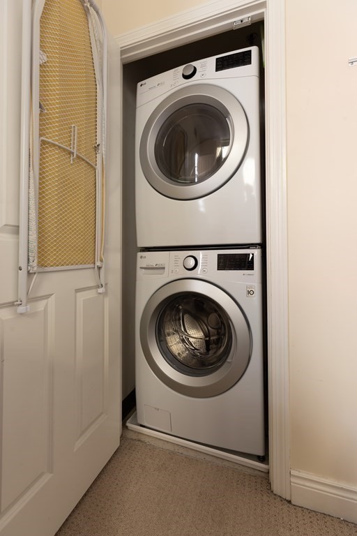 4 Charlesgate East, Unit 107 Boston, MA 02215 - Photo 9 of 12 a utility room with dryer and washer