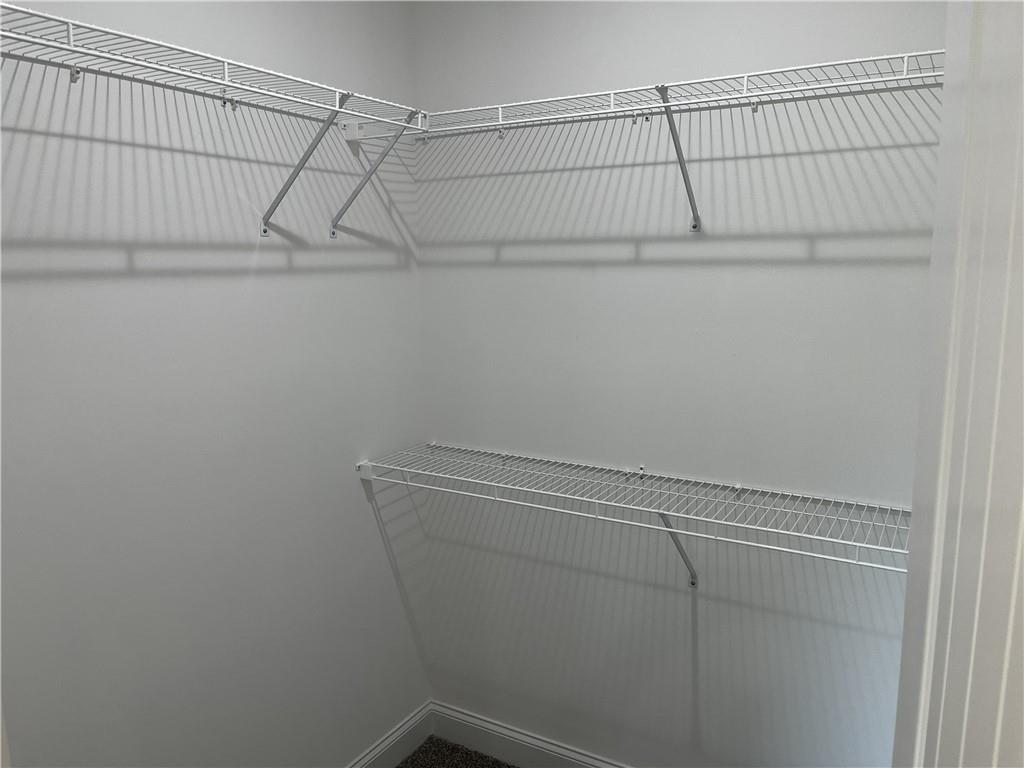 1932 Cochran Ridge Road Hiram, GA 30141 - Photo 26 of 30 a view of a room with racks on the wall