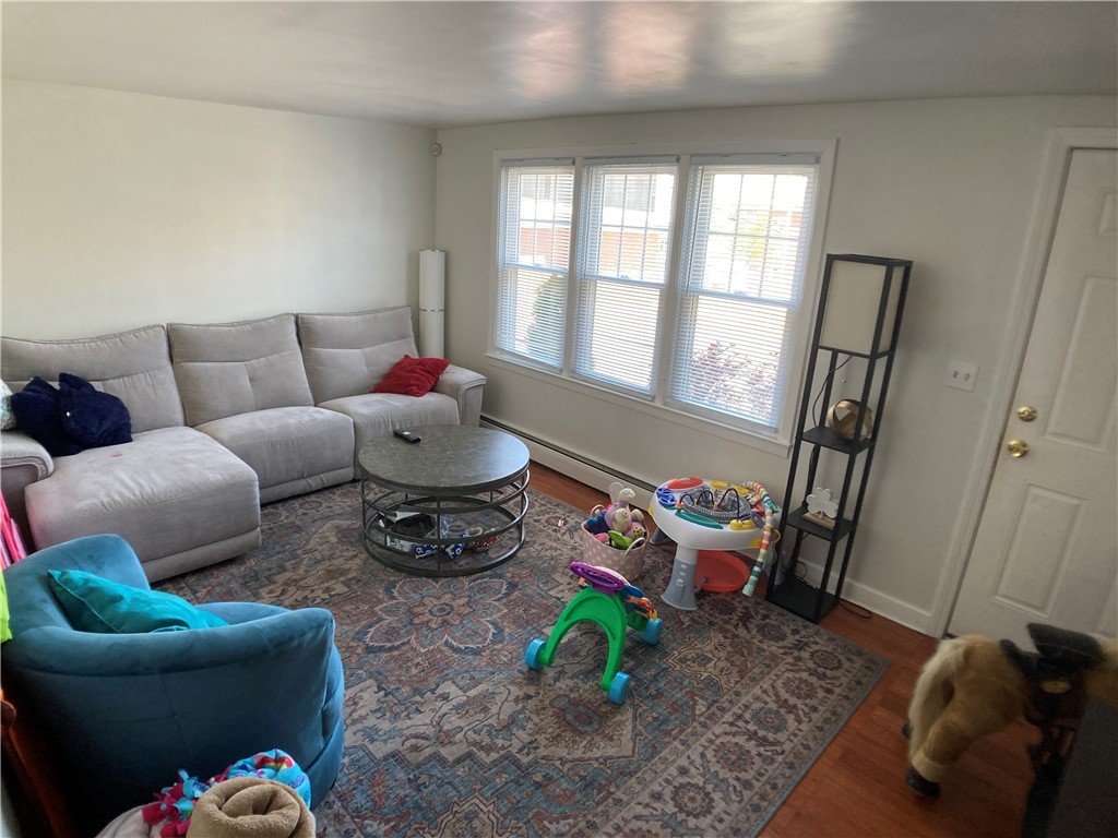 276 2nd Avenue Woonsocket, RI 02895 - Photo 4 of 11 first floor living room
