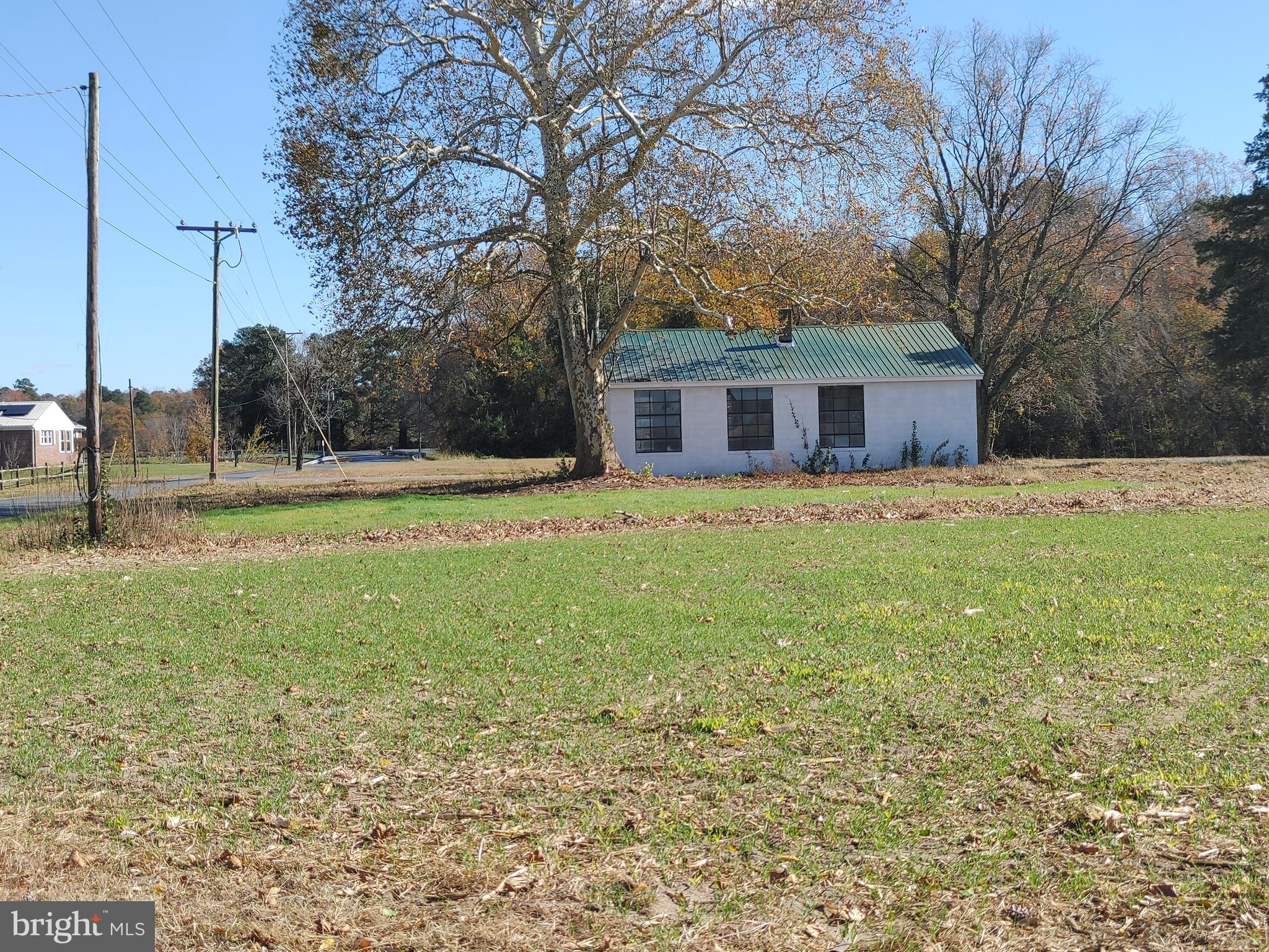 28035 Possum Hill Road Federalsburg, MD 21632 - Photo 19 of 23 a front view of house with yard and trees
