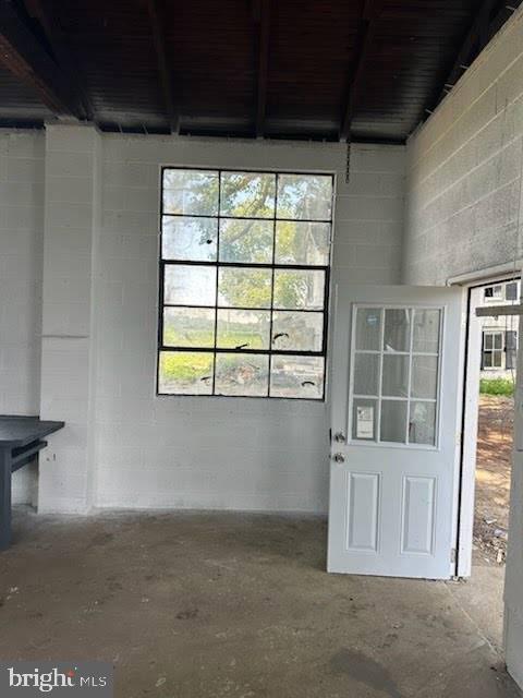 28035 Possum Hill Road Federalsburg, MD 21632 - Photo 10 of 23 a view of empty room with windows
