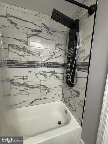 a bathroom with a bathtub