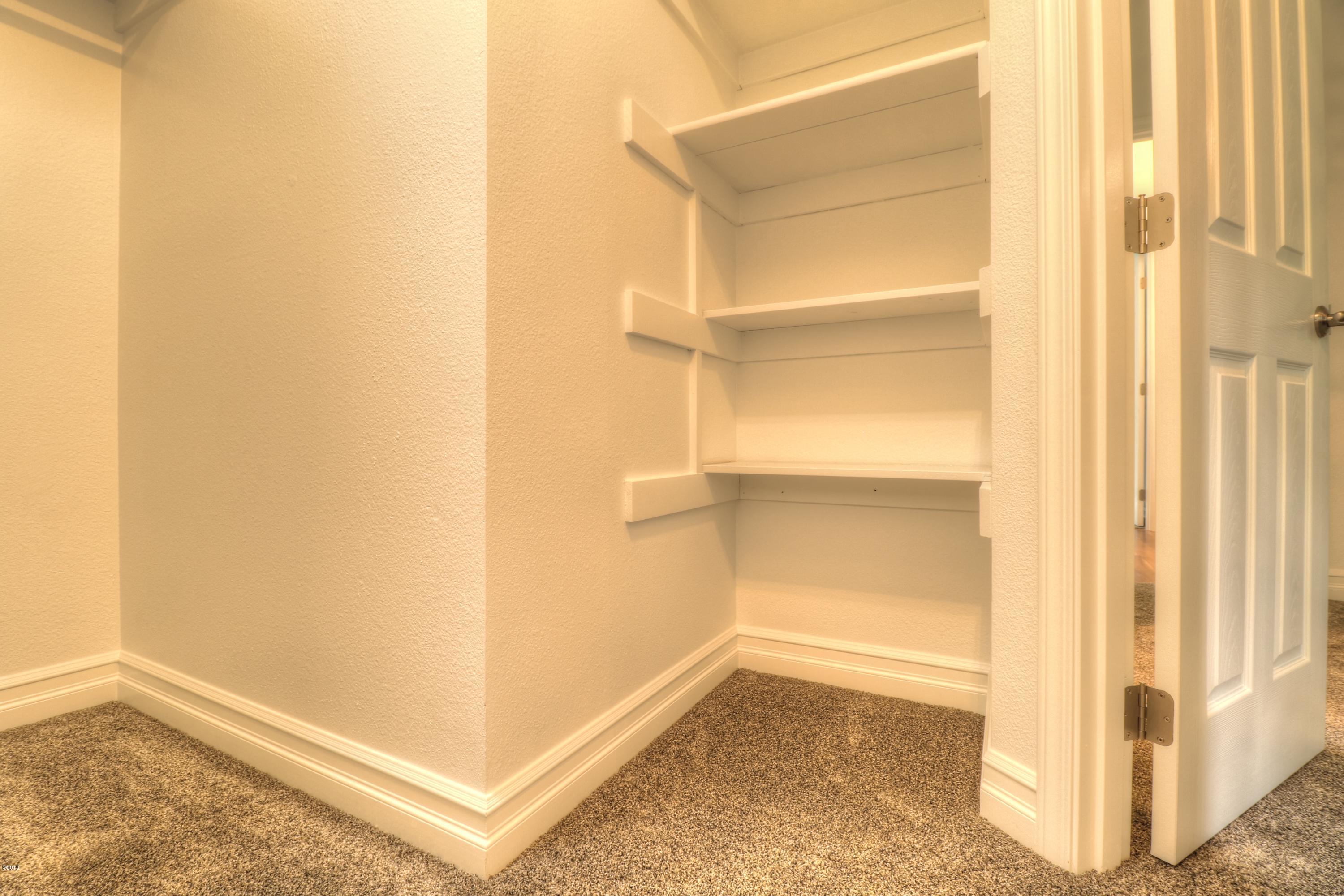 9775 Southeast Cedar Street South Beach, OR 97366 - Photo 30 of 33 Bedroom 3 Closet 2