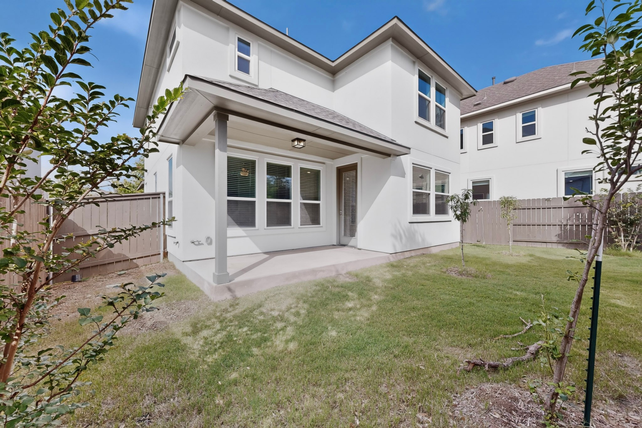2605 Sam Bass Road, Unit 9 Round Rock, TX 78681 - Photo 37 of 38 A private backyard oasis with a covered patio offers seamless indoor-outdoor living.