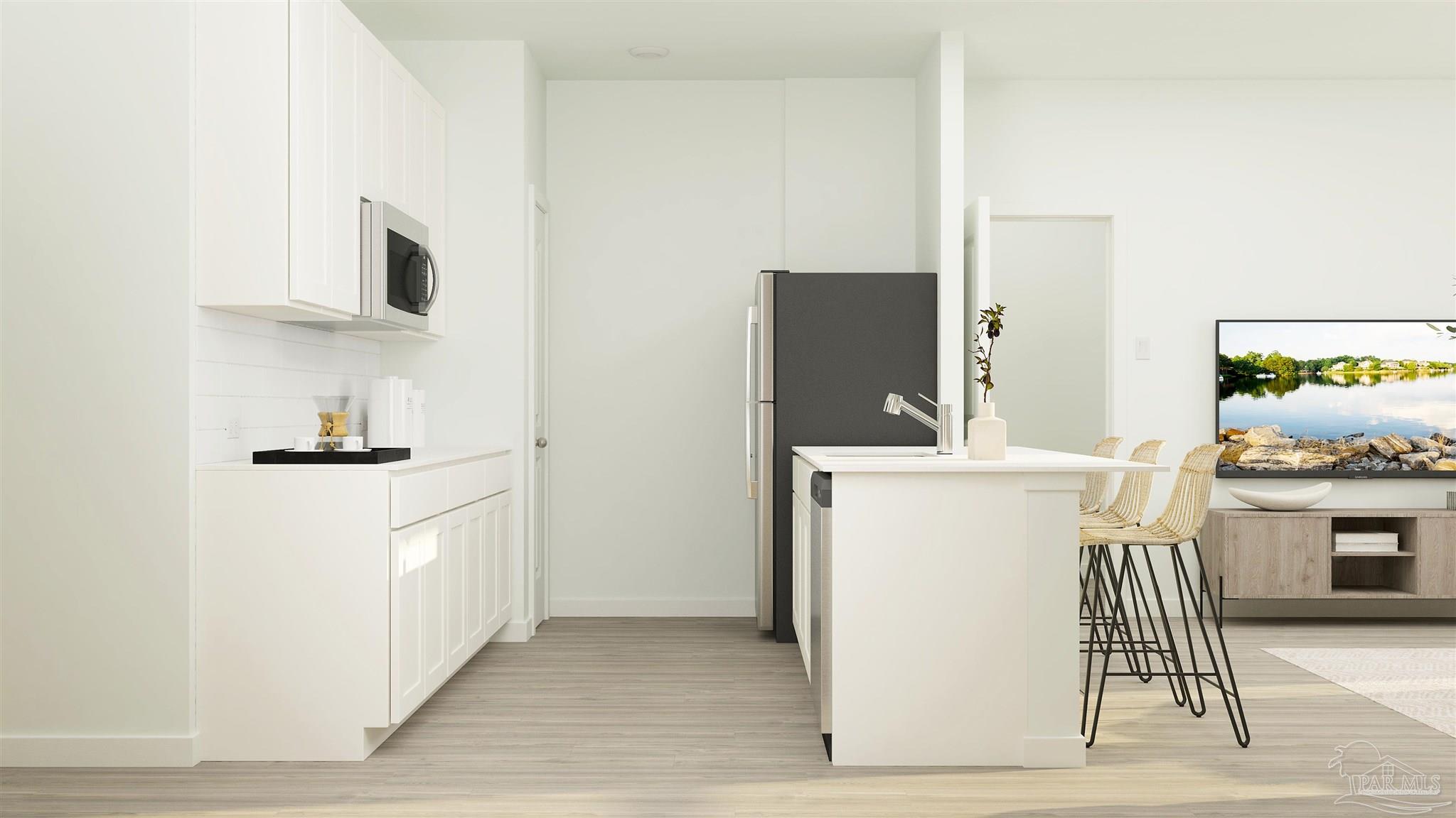 5964 Briarcliff Lane Pace, FL 32571 - Photo 16 of 28 a kitchen with a refrigerator and a stove