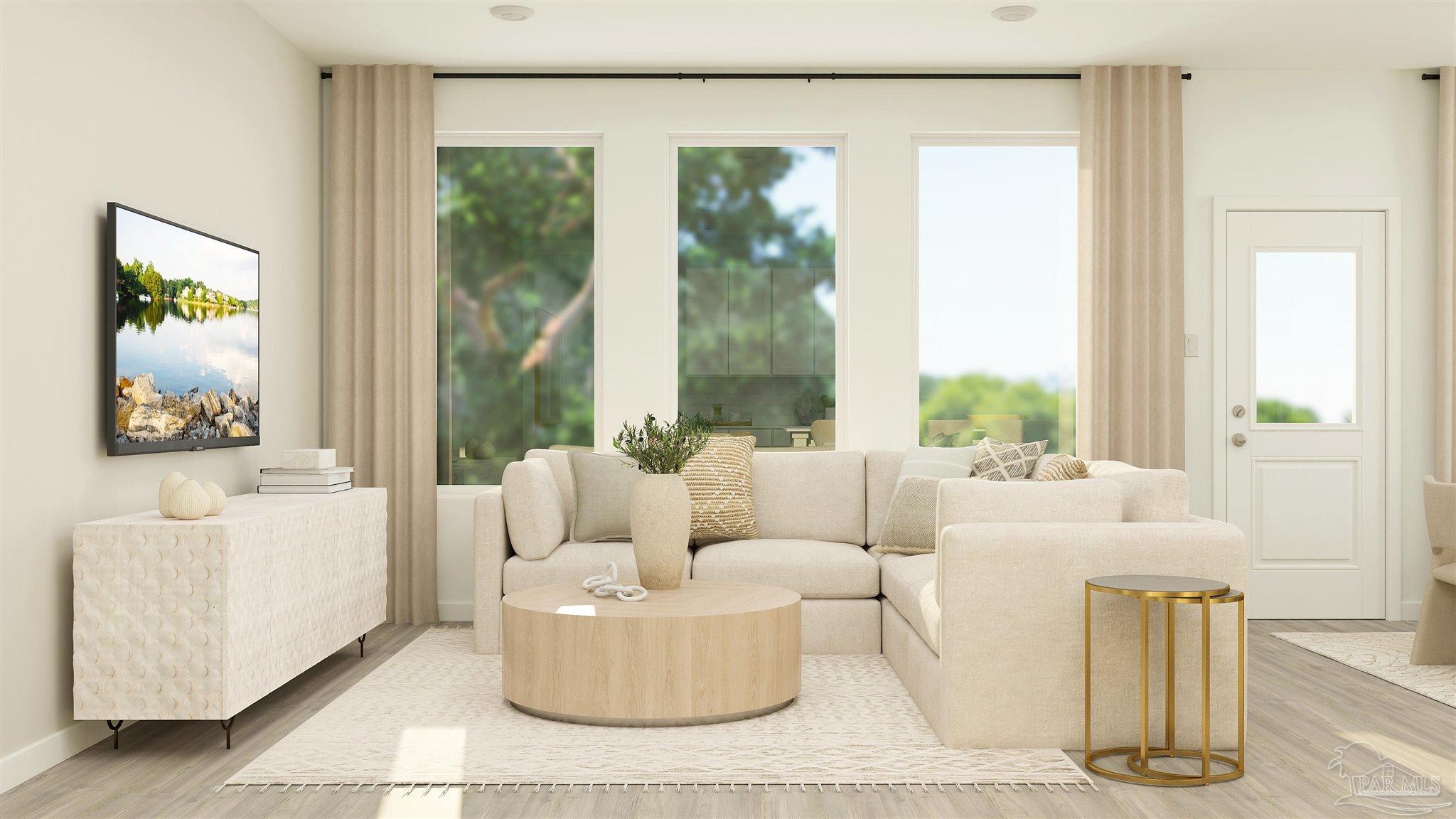 5964 Briarcliff Lane Pace, FL 32571 - Photo 8 of 28 a living room with furniture and a large window