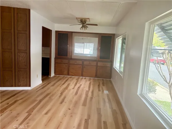 a room with window and a wooden floor