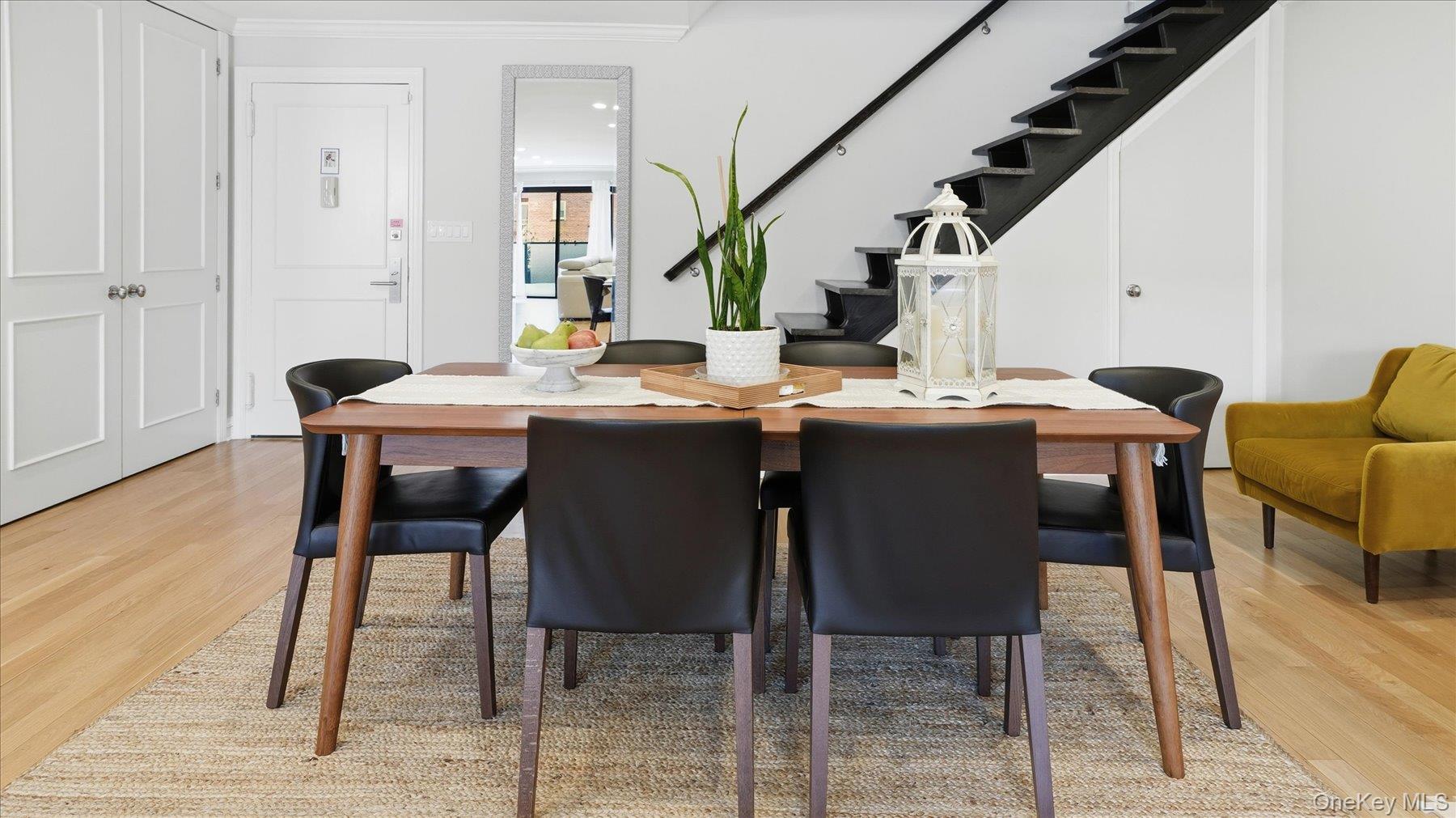 22 Park Place, Unit 4T Great Neck, NY 11021 - Photo 5 of 13 a view of a dining room with furniture