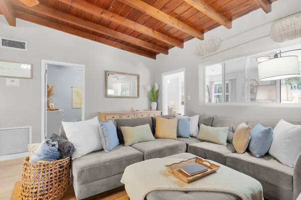 a living room with furniture and a couch