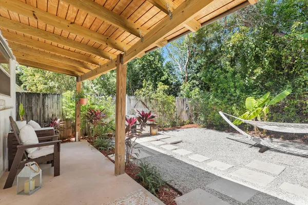 a view of a backyard with a patio