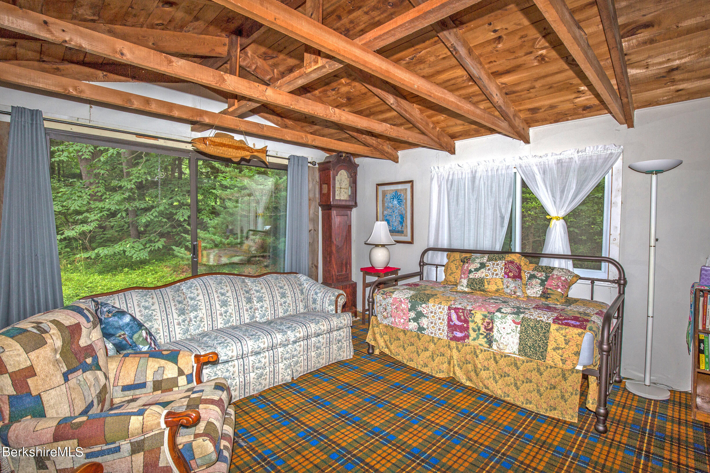 1146 East Otis Road Otis, MA 01029 - Photo 13 of 20 a living room with furniture and a large window