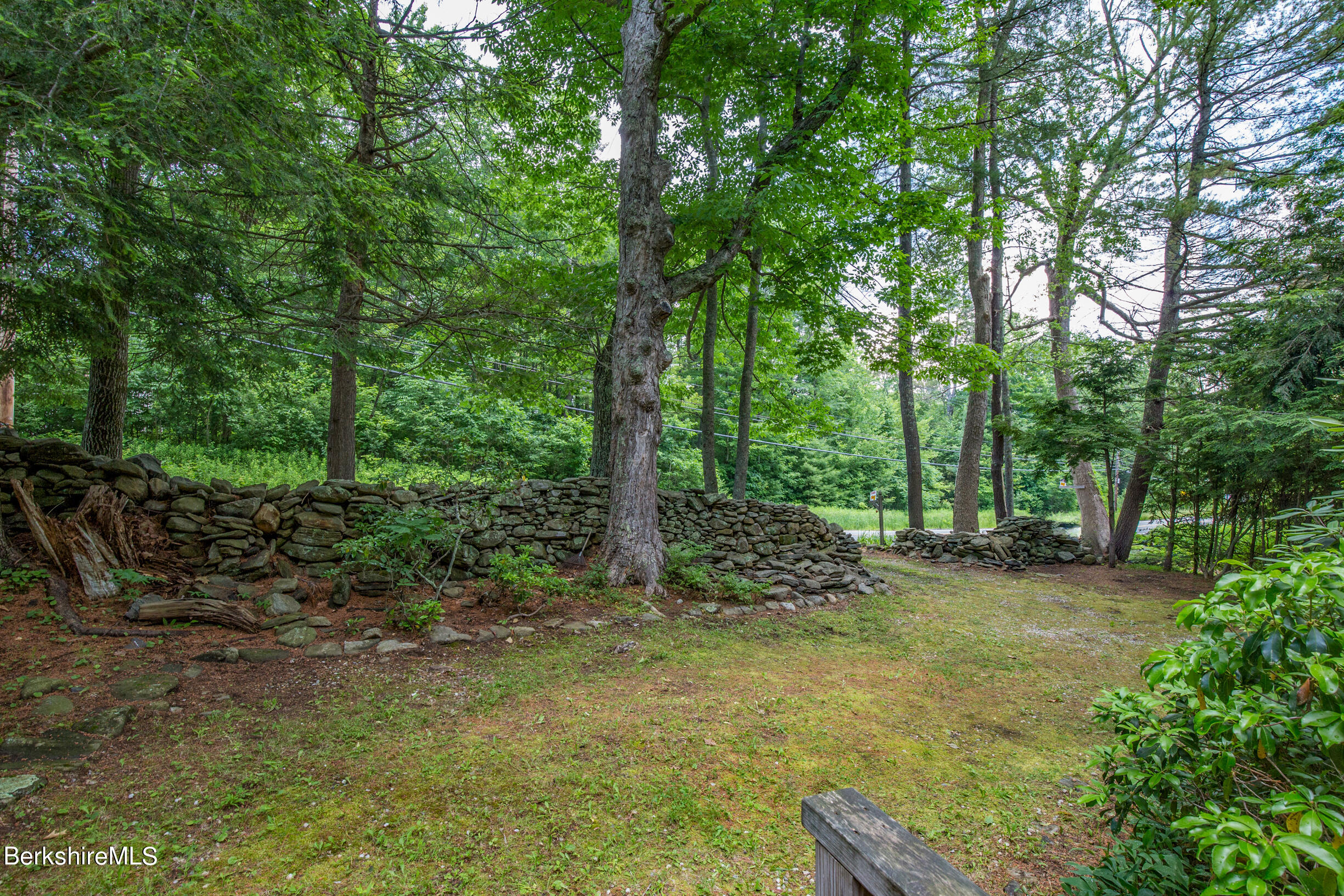 1146 East Otis Road Otis, MA 01029 - Photo 3 of 20 a big yard with lots of green space and trees