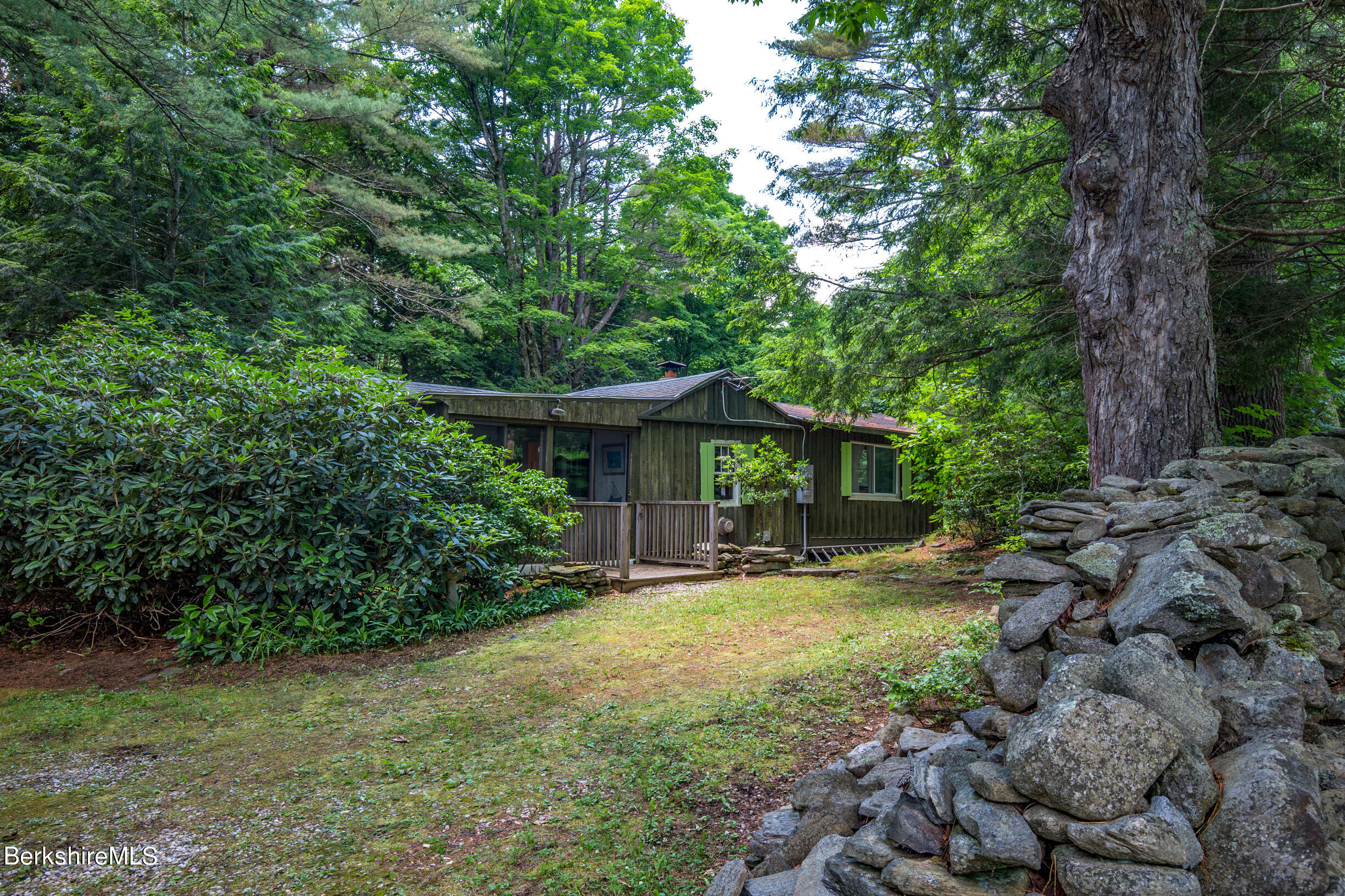 1146 East Otis Road Otis, MA 01029 - Photo 4 of 20 a view of a house with large trees