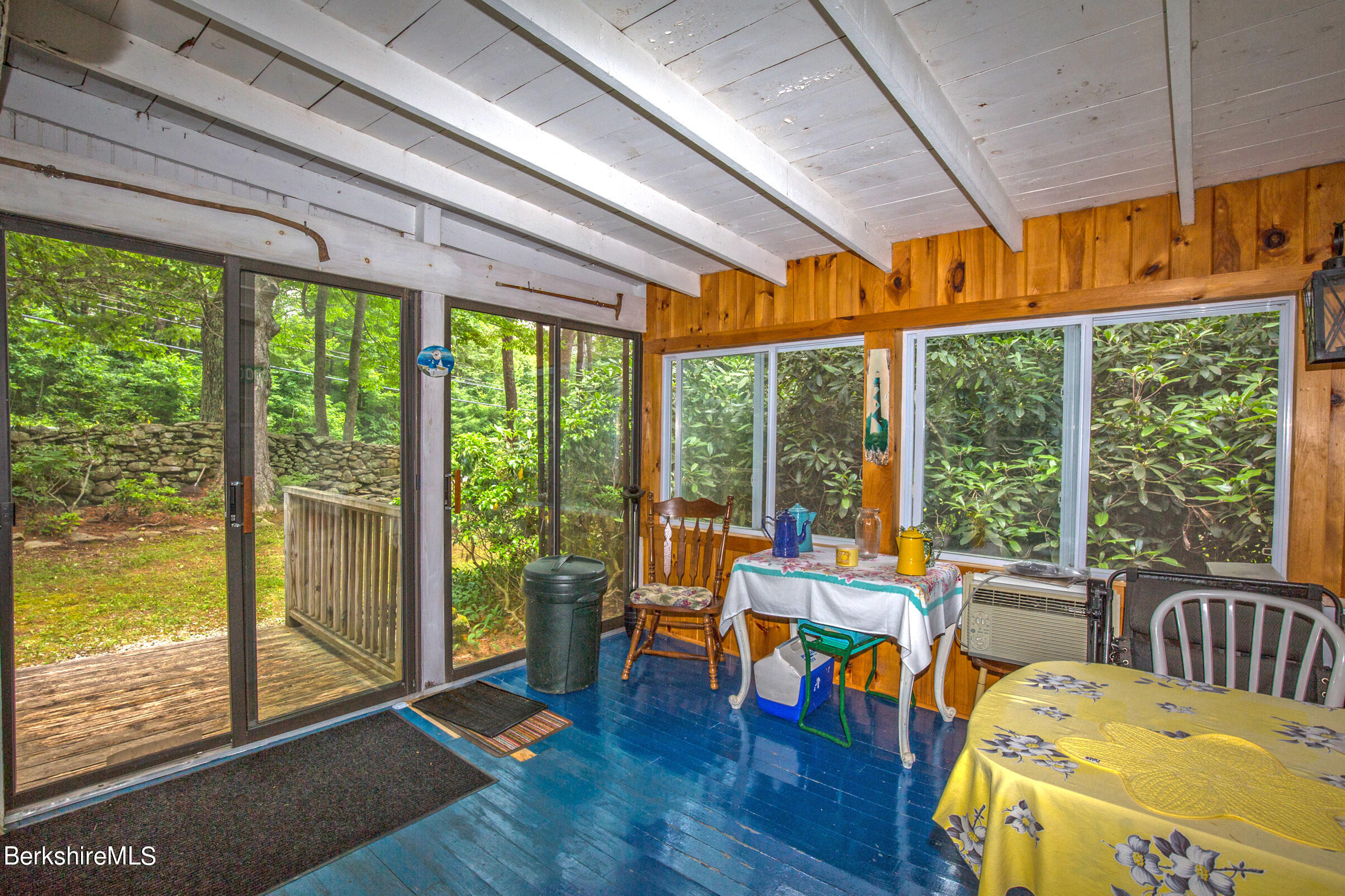 1146 East Otis Road Otis, MA 01029 - Photo 5 of 20 a living room with furniture and floor to ceiling windows