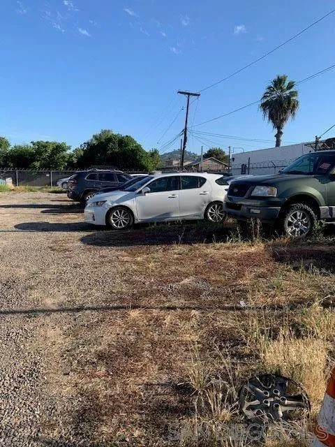 927 West Main Street El Cajon, CA 92020 - Photo 4 of 27 a view of a cars parked in a yard