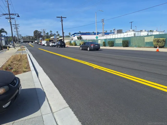 a view of a swimming pool with a lake view