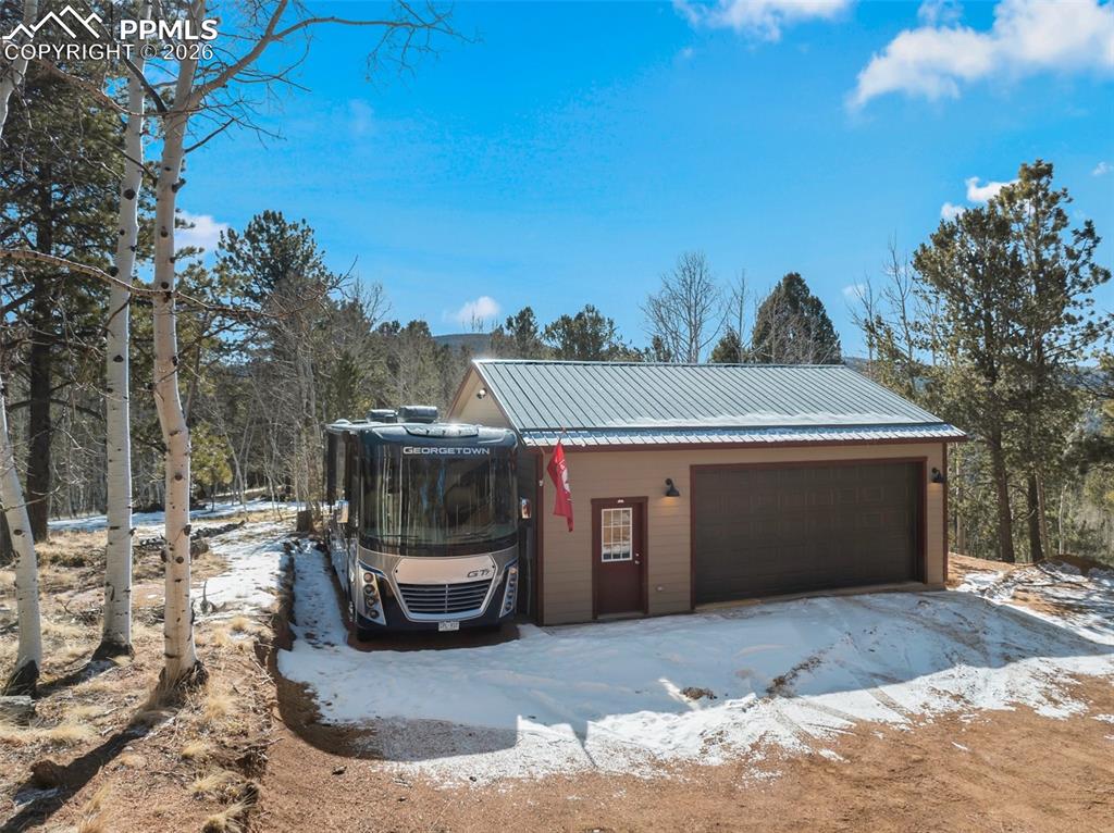 26 Blue Spruce Road Divide, CO 80814 - Photo 38 of 50 Large detached garage with extra space for parking or workshop!