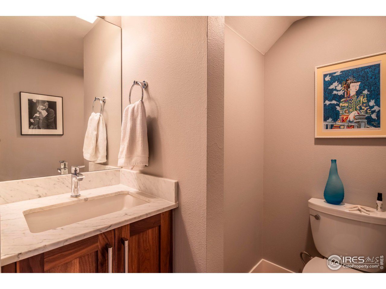 2058 Walnut Street, Unit A Boulder, CO 80302 - Photo 11 of 38 a bathroom with a sink vanity and a mirror