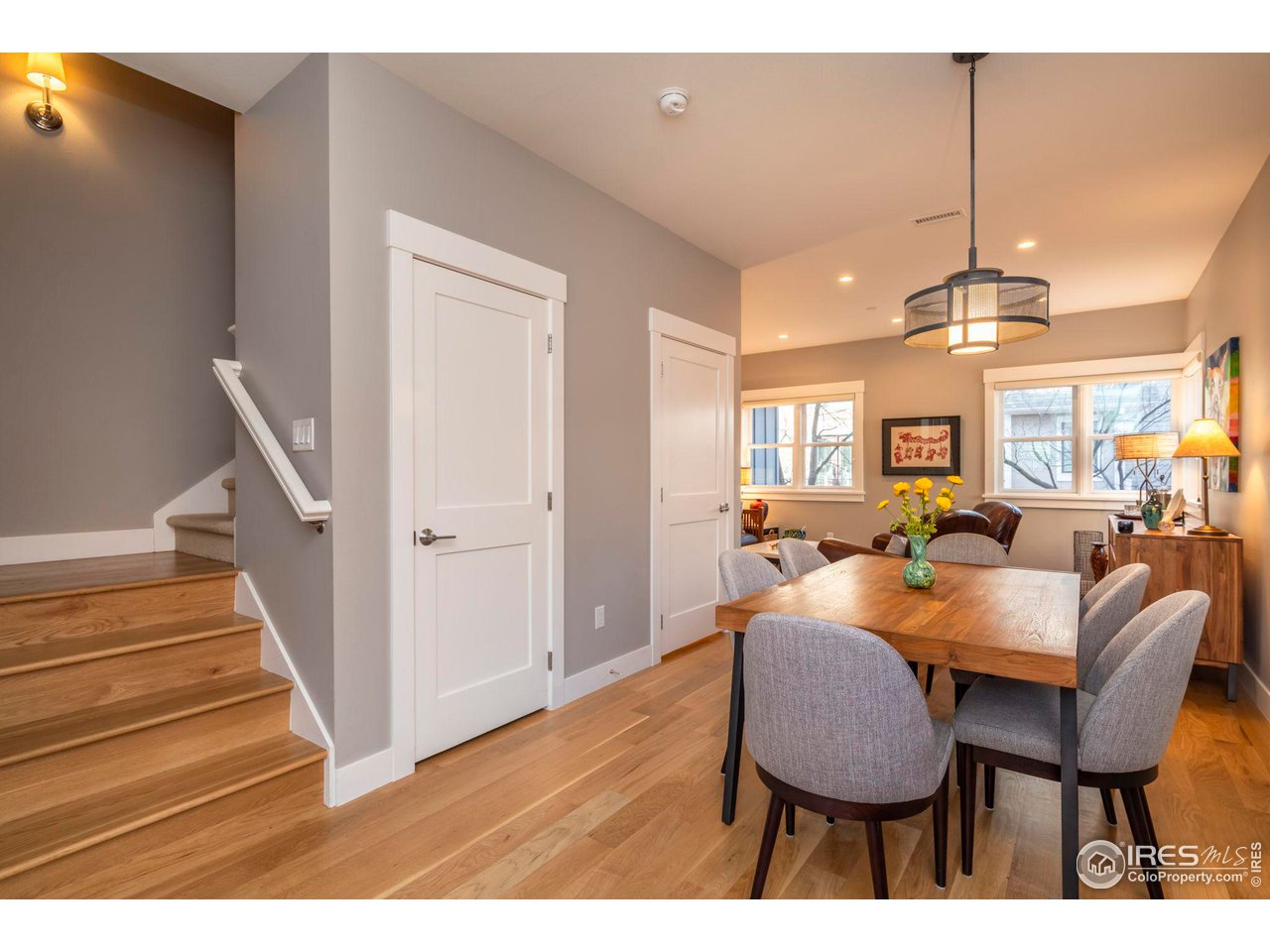 2058 Walnut Street, Unit A Boulder, CO 80302 - Photo 12 of 38 a dining room with furniture and wooden floor