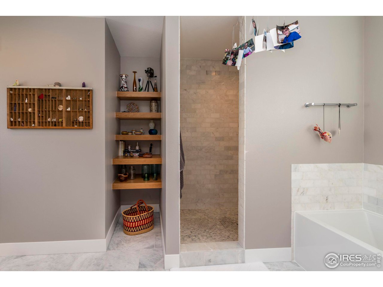 2058 Walnut Street, Unit A Boulder, CO 80302 - Photo 24 of 38 a bathroom with a bathtub and a shower