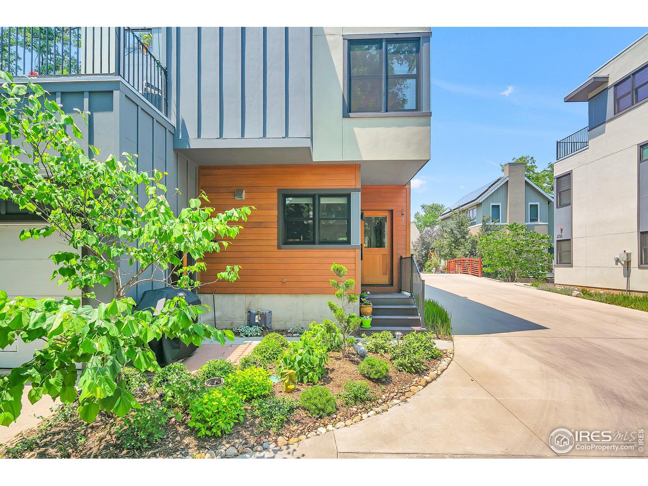 2058 Walnut Street, Unit A Boulder, CO 80302 - Photo 27 of 38 a view of a house with potted plants