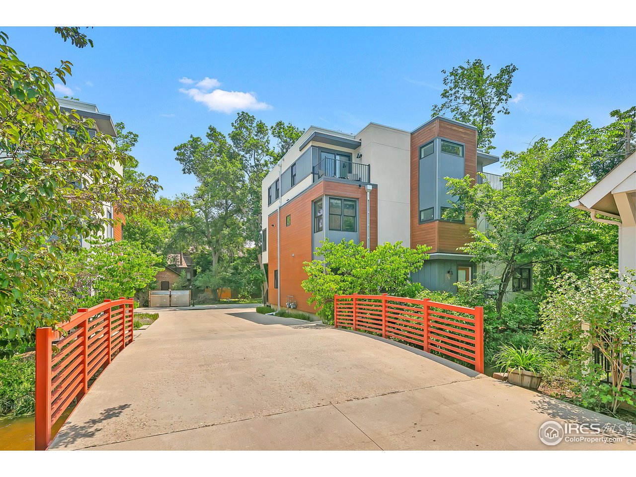 2058 Walnut Street, Unit A Boulder, CO 80302 - Photo 29 of 38 a view of a house with a yard and potted plants