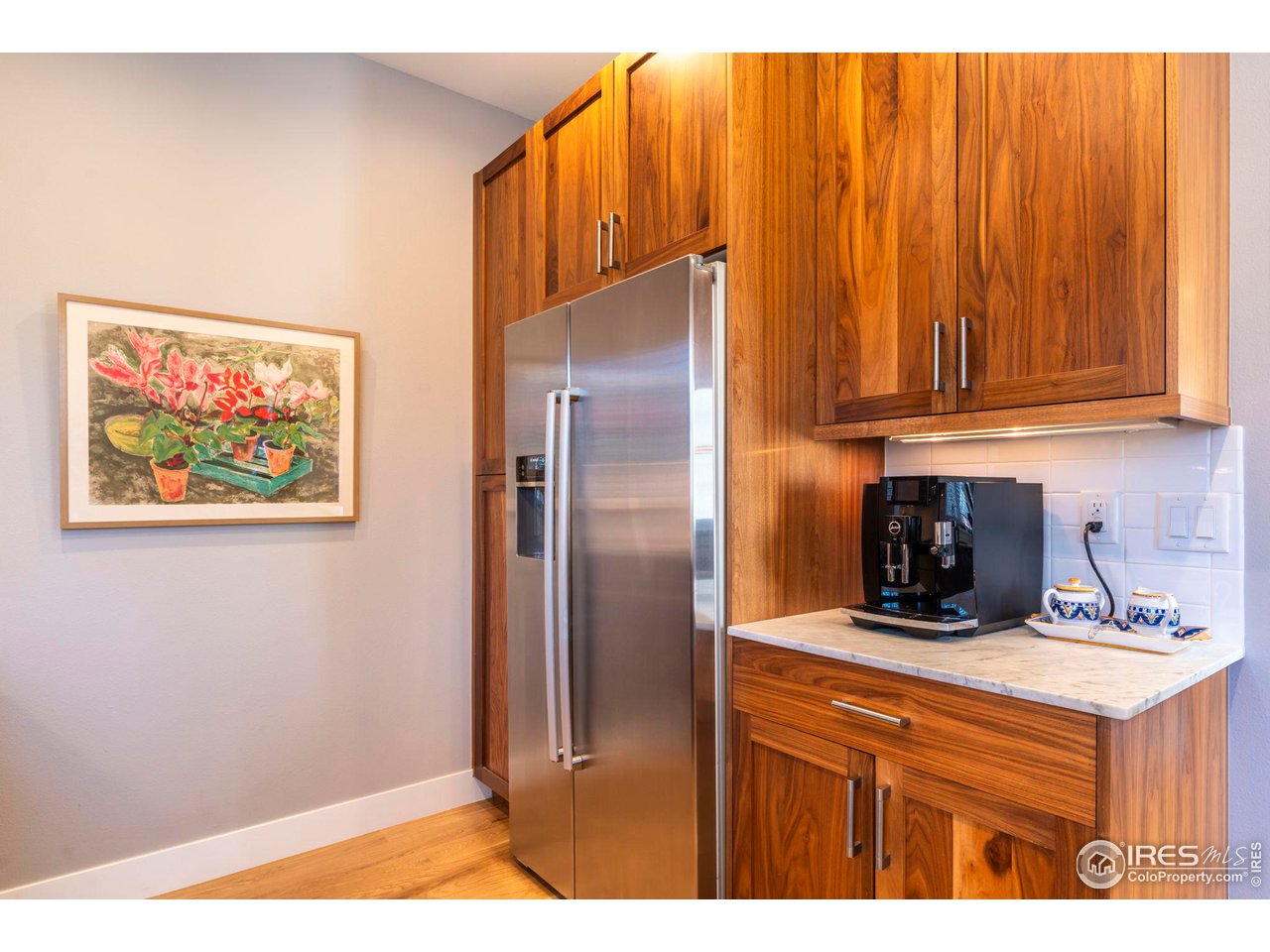 2058 Walnut Street, Unit A Boulder, CO 80302 - Photo 5 of 38 a kitchen with stainless steel appliances granite countertop a refrigerator and a sink