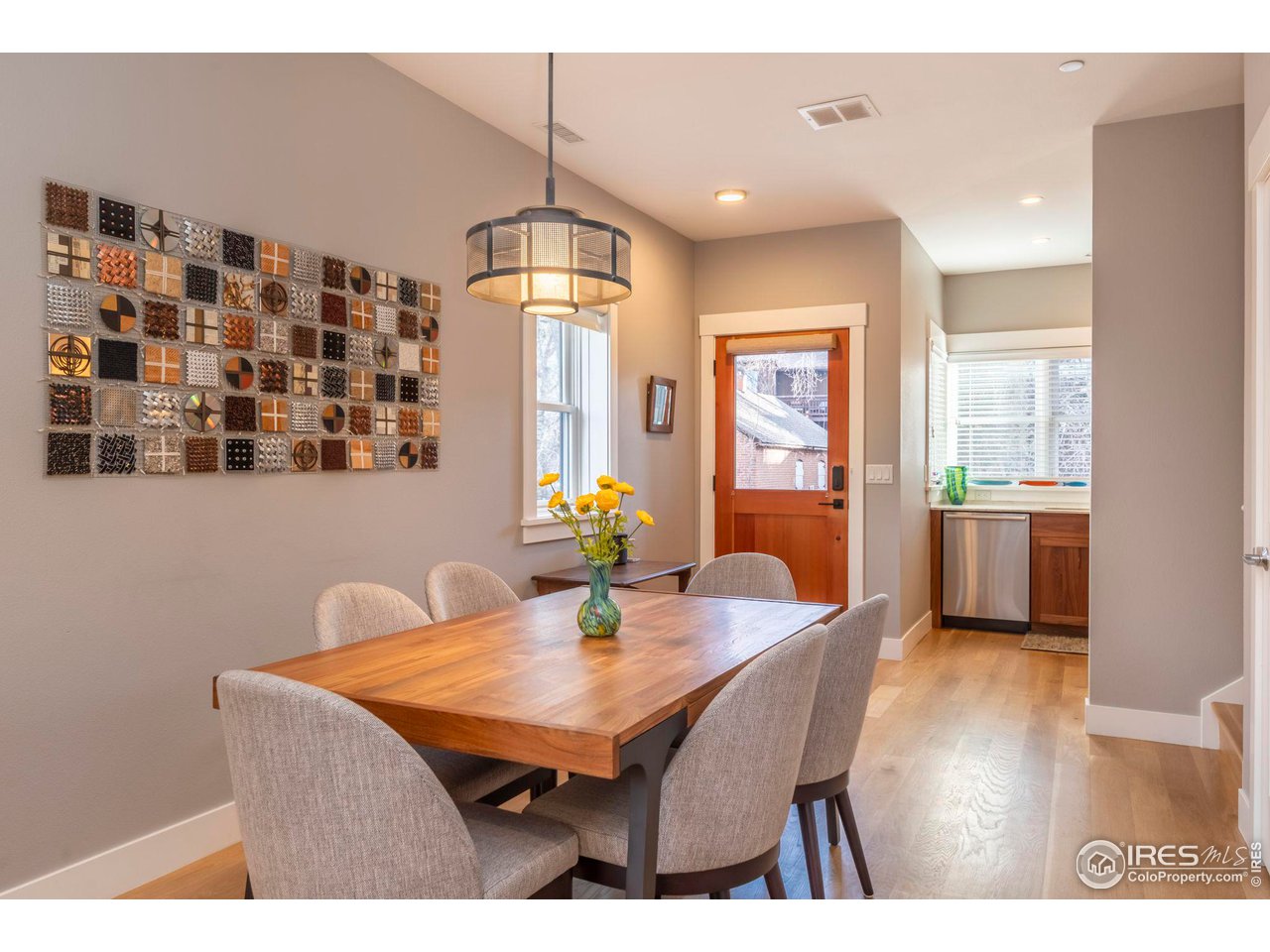 2058 Walnut Street, Unit A Boulder, CO 80302 - Photo 6 of 38 a view of a dining room with furniture window and wooden floor